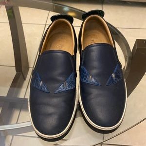 fendi blue with green eyes